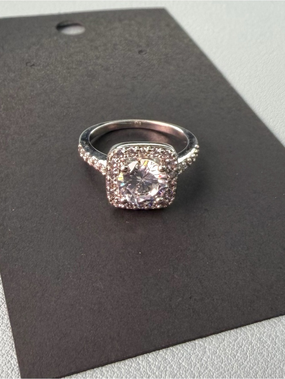 Sterling Silver Halo Ring with White Center Stone